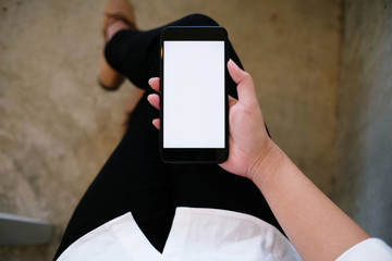Close up of women's hands holding cell telephone blank copy space screen. smart phone with technology concept