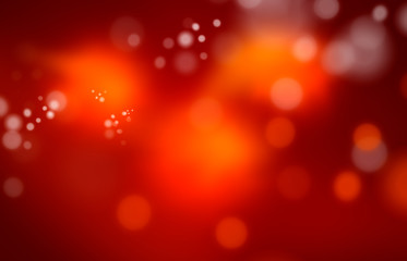 An abstract illustrated red, orange and yellow warm bokeh background.