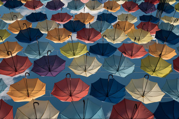 wallpaper with umbrellas in sky;
