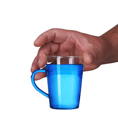 a glass of water held in your hand