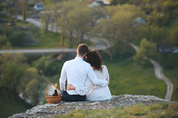Couple Enjoying View from Hill