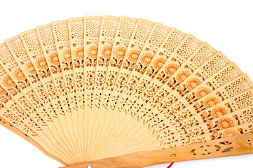 Wooden carve folding  chinese style hand fan on white background.