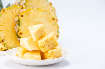 sliced pineapple isolated on white background