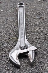 A large steel adjustable wrench spanner