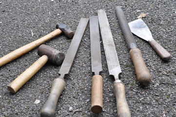 A selection of old wooden handled tools