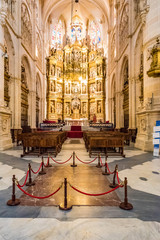 Main chapel and El Cid's tomb in the Burgos Cathedral, Spain. The Burgos Cathedral is a UNESCO...