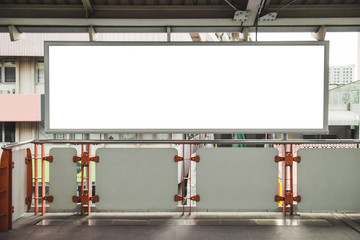 Blank white billboard for advertisement on street.