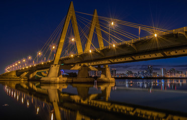 Fototapeta na wymiar Millenium bridge in Kazan, reflected in the waters of the river Kazanka. Russia