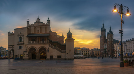 Naklejka na ściany i meble The main square in Krakow at sunrise, Poland-Panorama