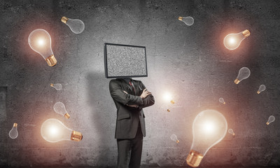 Businessman with TV instead of head.