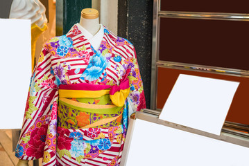 View of the colorful kimono in the store, Kyoto, Japan. Frame for text.