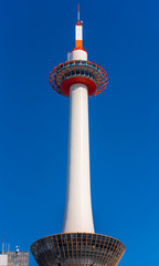 KYOTO, JAPAN - NOVEMBER 7, 2017: Kyoto Tower on blue sky background. Copy space for text. Vertical.