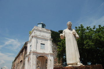 Exterior of St. Paul's Church  with St. Francis Xavier statue, Melaka city, Malaysia