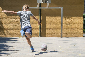 Street soccer kick