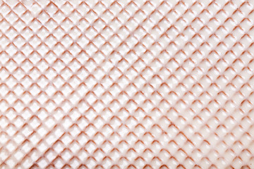 Fototapeta premium White hot chocolate on the wafer. Waffle covered with condensed milk close-up.