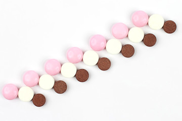 different medicinal pills on white background