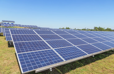 Close up rows array of polycrystalline silicon solar cells or photovoltaics in solar power plant...