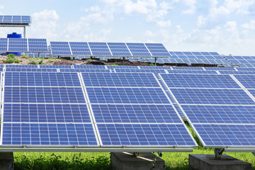                        Close up rows array of polycrystalline silicon solar cells or photovoltaics in solar power plant turn up skyward absorb the sunlight from the sun 