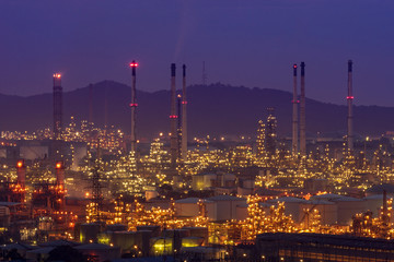 Fototapeta na wymiar scenic of oil refinery factory on twilihgt skyline
