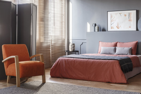 Orange and grey bedroom interior