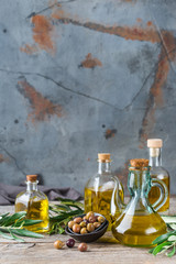 Assortment of fresh organic extra virgin olive oil in bottles