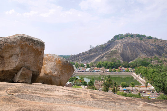 General view of Vindhyagiri hill temple complex, Sravanabelgola, Karnataka. View from Chandragiri hill. Large Belgola, white pond, is also seen.