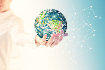 Earth from Space in hands, globe in hands Best Internet Concept of global business from concepts series. Elements of this image furnished by NASA. 3D illustration.