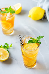 Lemon mint iced tea cocktail refreshing drink for summer days