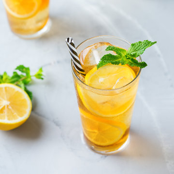 Lemon mint iced tea cocktail refreshing drink for summer days