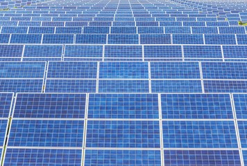                   Close up rows array of polycrystalline silicon solar cells or photovoltaics in...