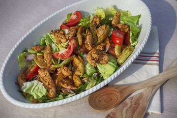 Delicious mixed salad with grilled chicken and zucchini