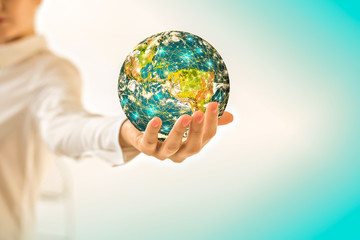 Earth from Space in hands, globe in hands Best Internet Concept of global business from concepts series. Elements of this image furnished by NASA. 3D illustration.