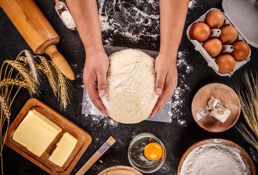 Fresh dough with various ingredients