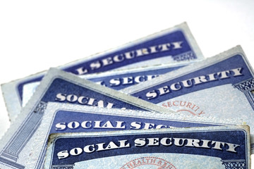 Social Security Cards in a Row Pile for Retirement