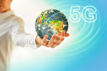 Earth from Space in hands, globe in hands. 5G k Internet mobile wireless concept. Elements of this image furnished by NASA. 3D illustration.
