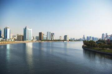 Fototapeta na wymiar Arab city on the water. United Arab Emirates, Sharjah.