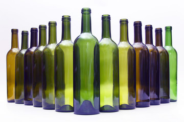 empty bottles of wine on white background