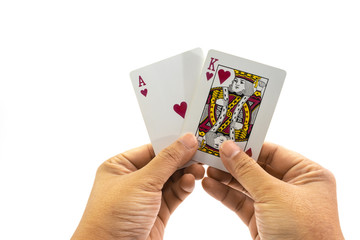 Poker heart king and ace in the hand of man isolated