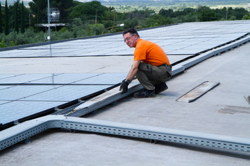 fitting photovoltaic panels on a roof