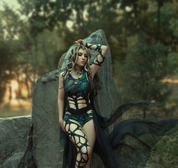 Image of Gorgon Medusa, braid hair and gold snakes, close-up portrait. Gothic make-up in green...