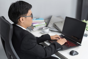 business man using laptop computer