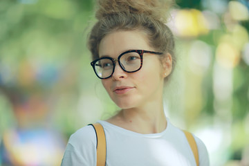 portrait of a girl wearing glasses