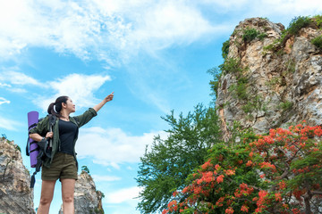 Asian Women Traveler or hiking with backpack mountaineering  lake and mountains on background Summer expedition vacations outdoor.  Travel Lifestyle concept