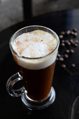 cappuccino in glass in cafe