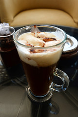 cappuccino in glass in cafe