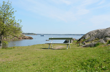 Empty bench on a hilltop above the water on Suomenlinna