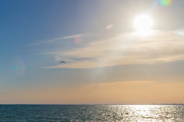 Beautiful summer sunset with clouds over the sea