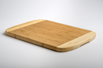 Isolated rectangular wooden chopping board