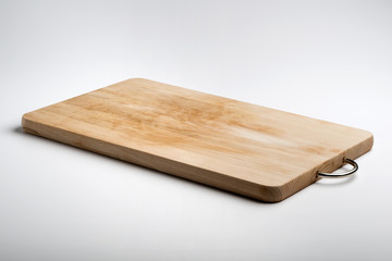 Isolated rectangular wooden chopping board