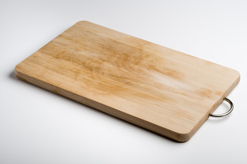 Isolated rectangular wooden chopping board